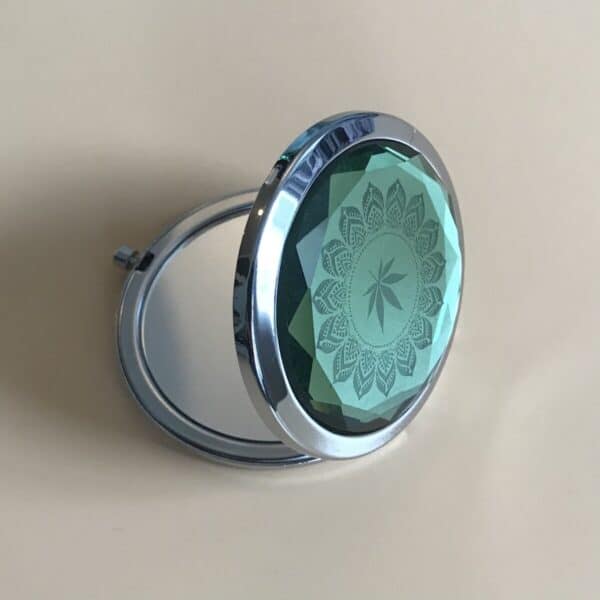 Fashionably high emerald pocket mirror. Canada