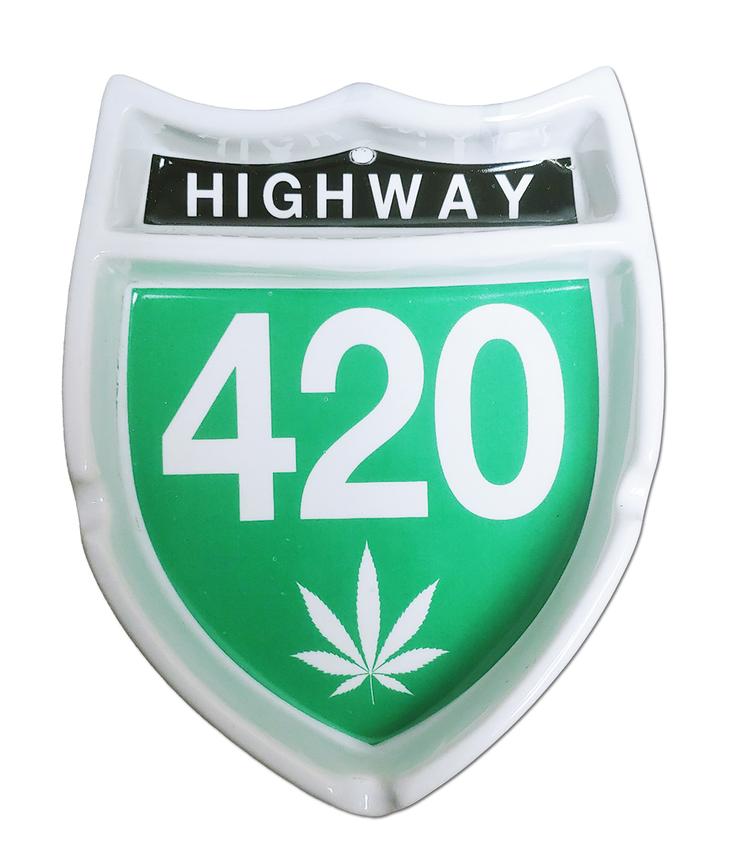 Ashtray with Highway written on the top and 420 on the bottom with a green background.