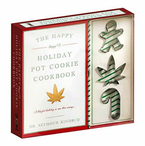 The Happy Holiday Pot Cookie Cookbook in box with Cookie cutters of a gingerbread man, cannabis leaf and candy cane.